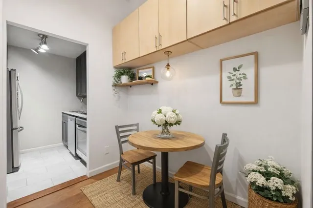 a view of a dining room with furniture