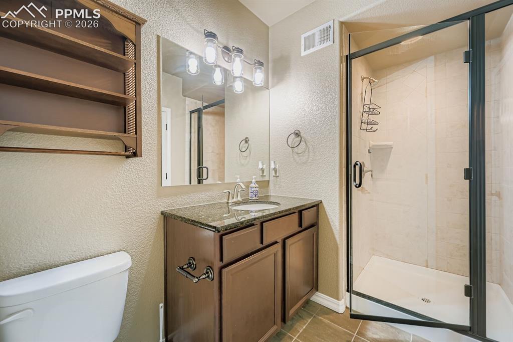 10625 Slumber Ridge Way Colorado Springs, CO 80908 - Photo 25 of 36 ensuite for bedroom 4