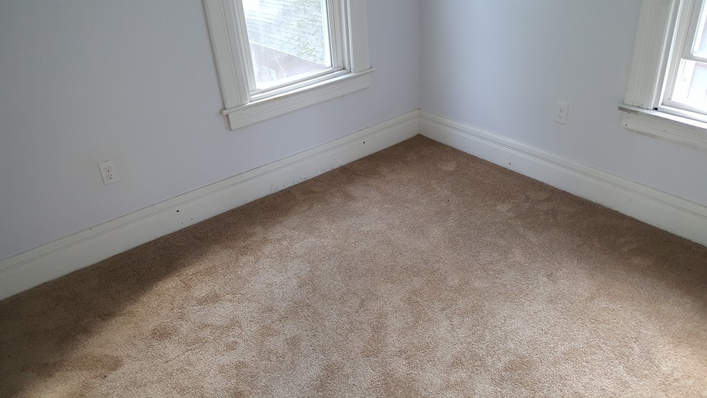 99 Alden Street Springfield, MA 01109 - Photo 14 of 21 an empty room with a window