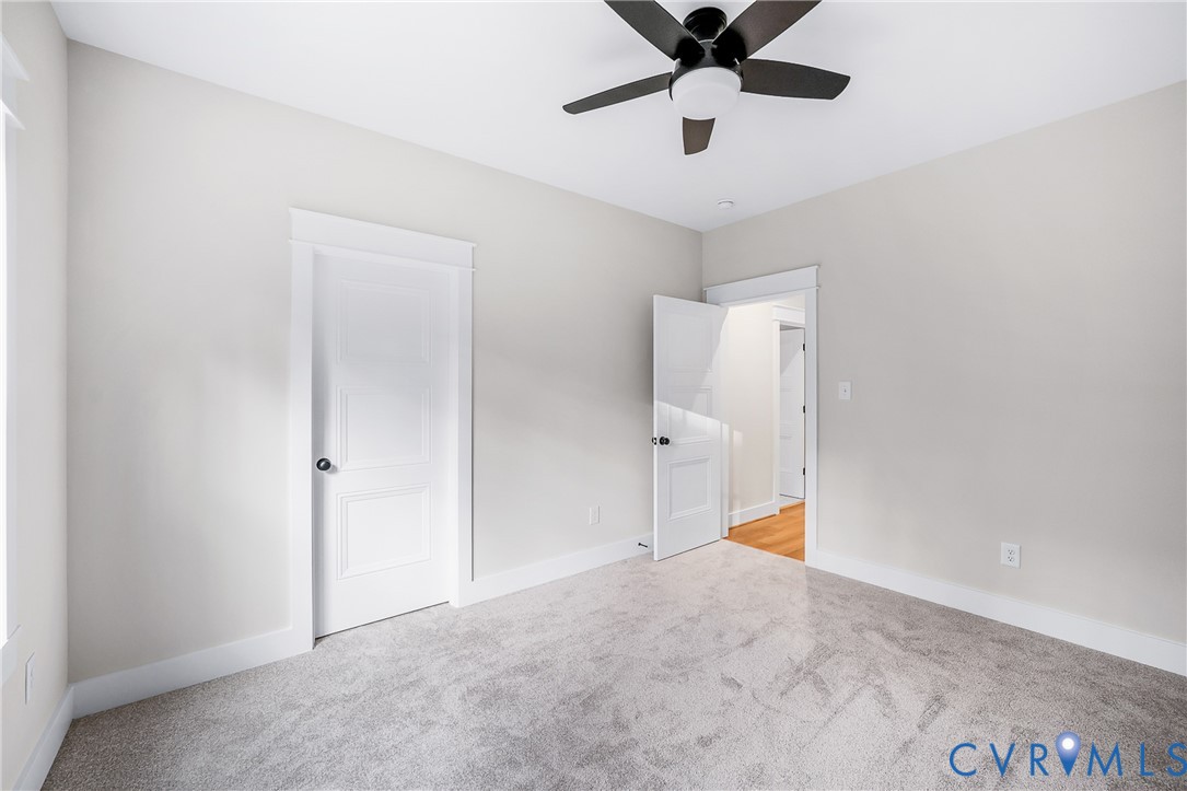 8299 Pamlico Road Ashland, VA 23005 - Photo 20 of 35 a view of an empty room and chandelier fan