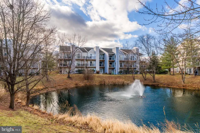 a view of a lake with houses