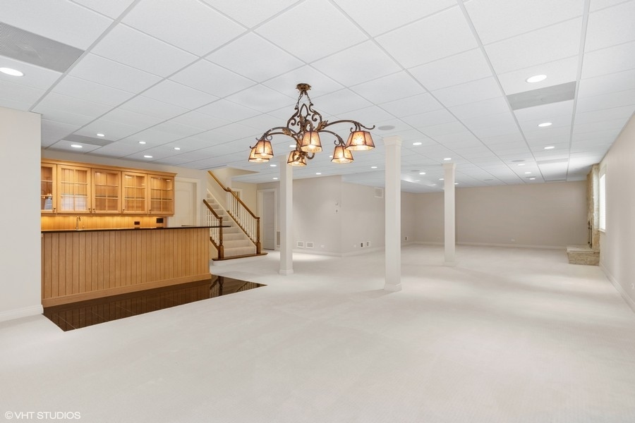 55 Stone Gate Road Lake Forest, IL 60045 - Photo 44 of 62 a view of an empty room with a window