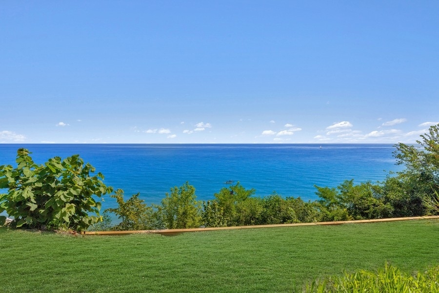 55 Stone Gate Road Lake Forest, IL 60045 - Photo 53 of 62 a view of a field with an ocean view