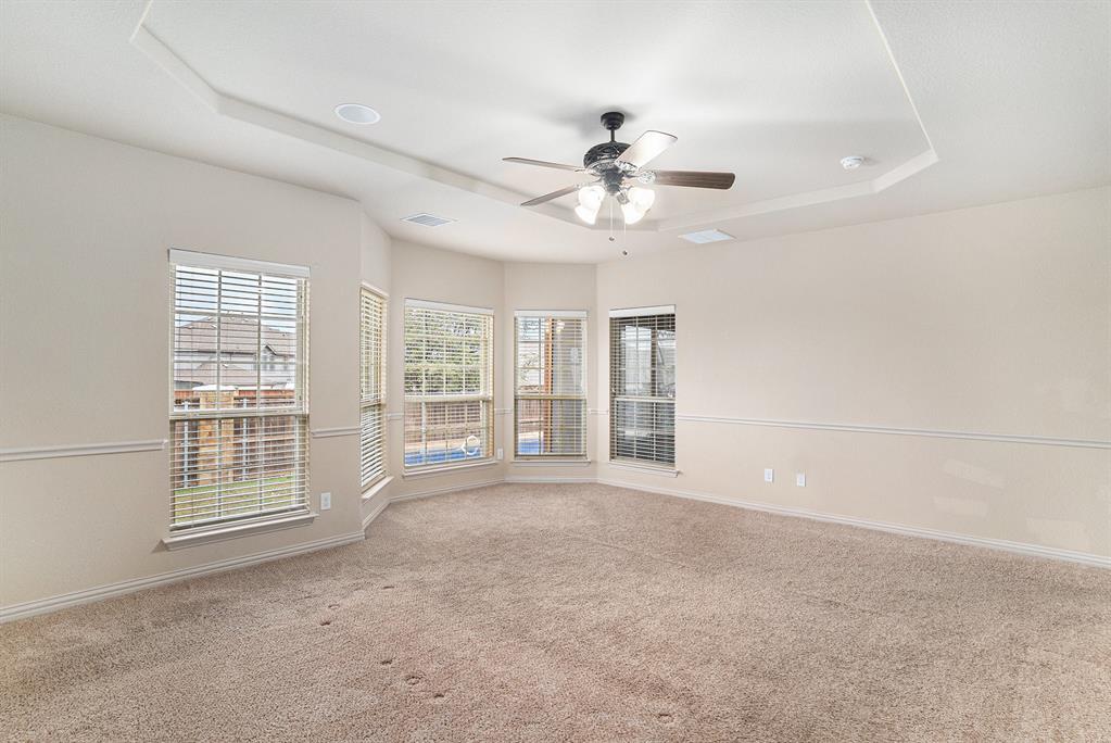 6132 Falls Lake Road Fort Worth, TX 76179 - Photo 18 of 37 a view of an empty room with a window