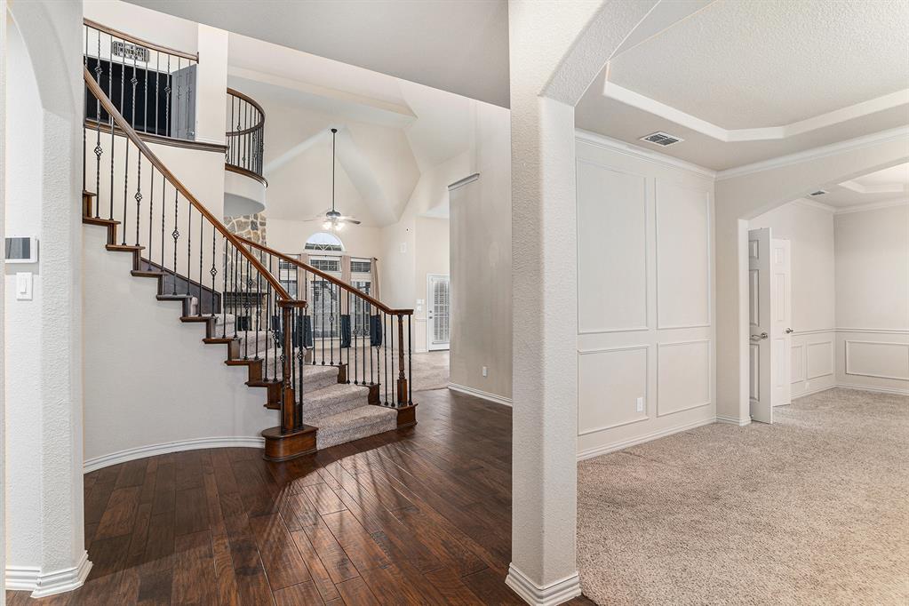6132 Falls Lake Road Fort Worth, TX 76179 - Photo 2 of 37 a view of entryway and hall with wooden floor