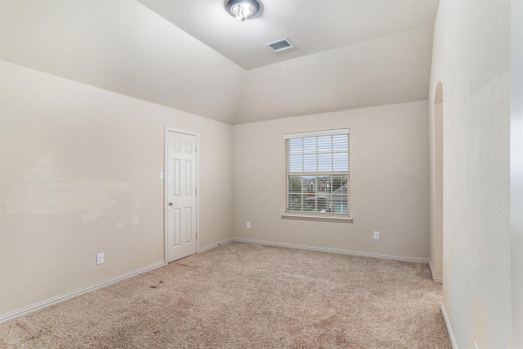 6132 Falls Lake Road Fort Worth, TX 76179 - Photo 22 of 37 an empty room with a window