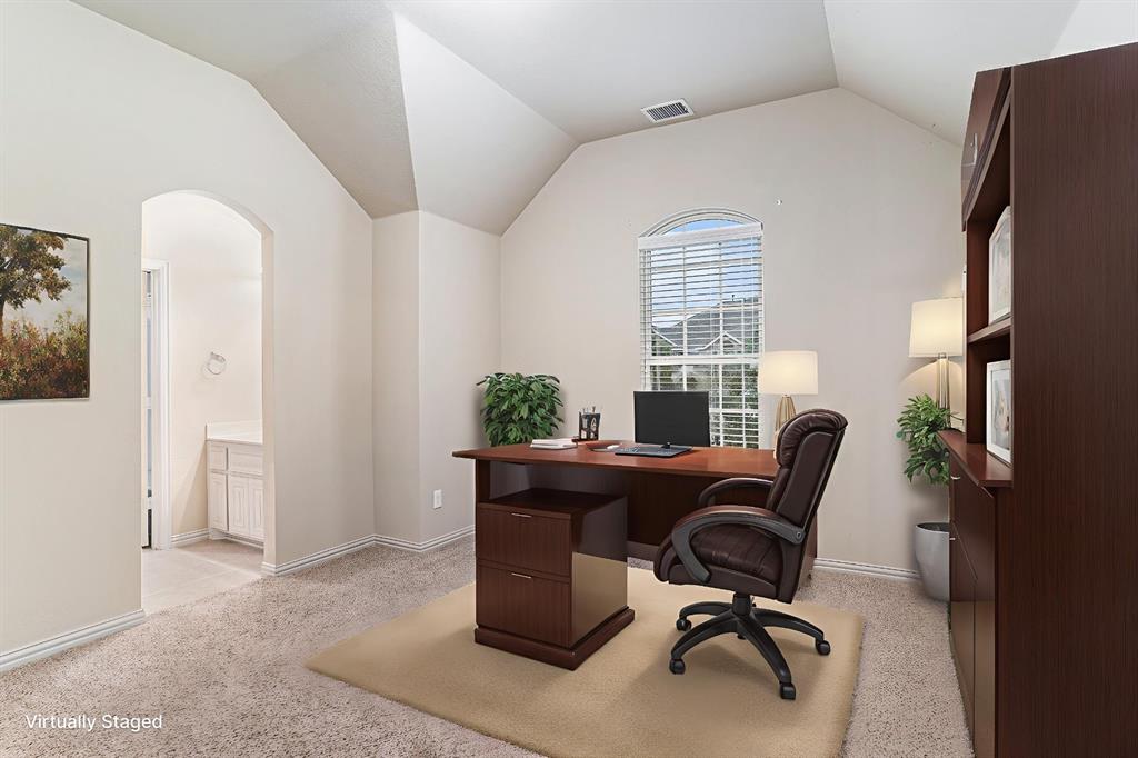 6132 Falls Lake Road Fort Worth, TX 76179 - Photo 25 of 37 a view of a workspace with furniture and a window