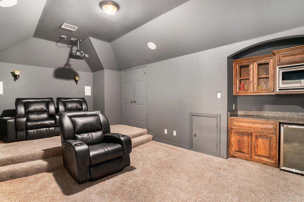 6132 Falls Lake Road Fort Worth, TX 76179 - Photo 30 of 37 a living room with furniture