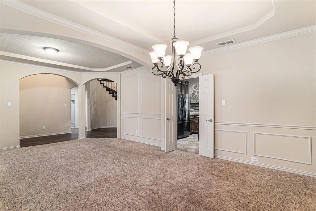 6132 Falls Lake Road Fort Worth, TX 76179 - Photo 4 of 37 a view of a chandelier in a room