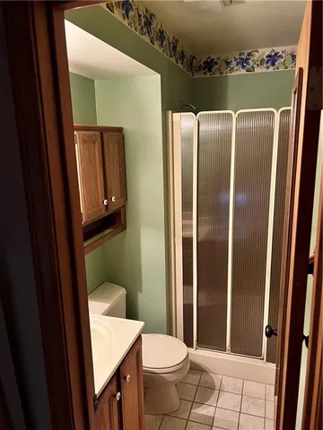 a room with furniture and wooden floor