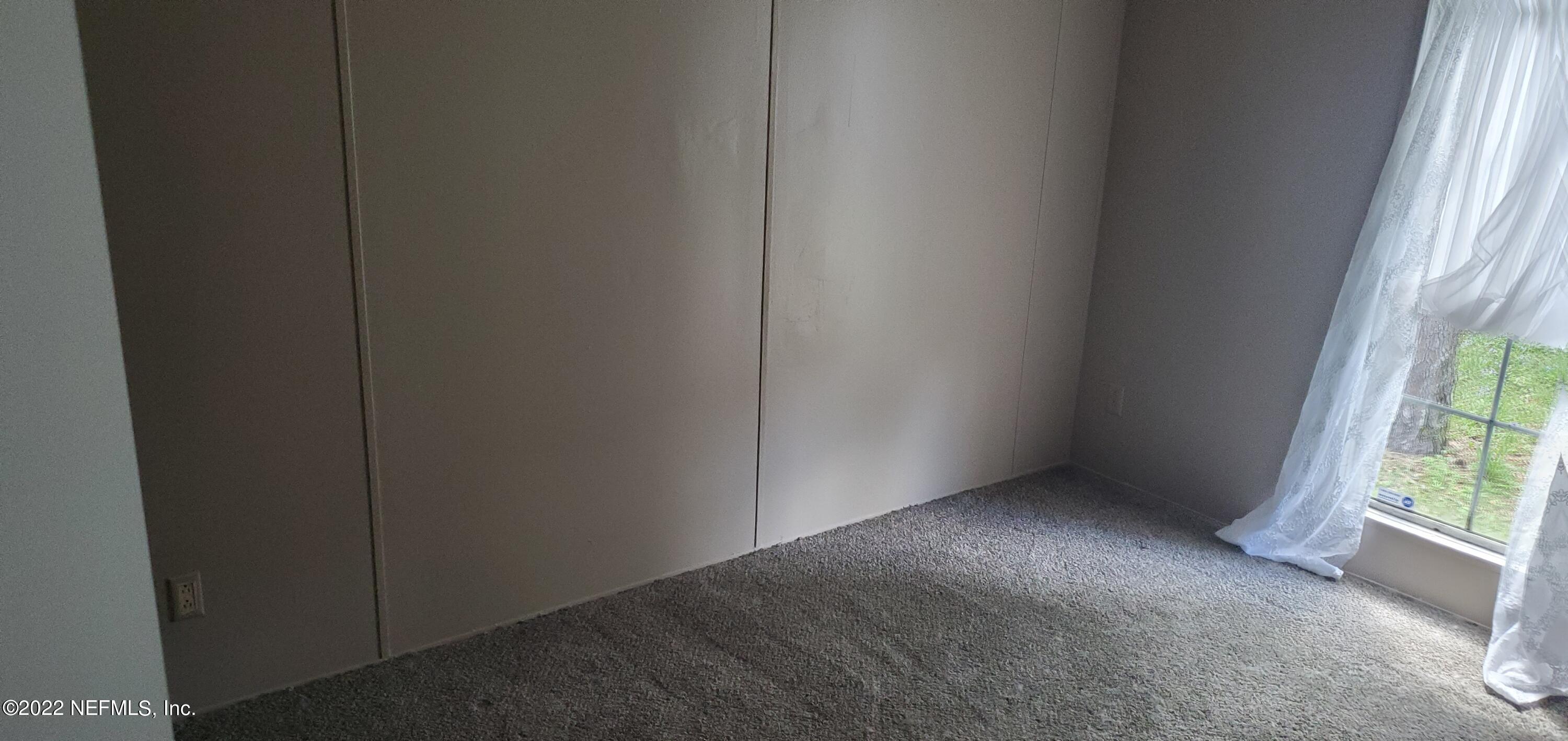 13464 Yellow Bluff Road Jacksonville, FL 32226 - Photo 19 of 20 a view of room with window