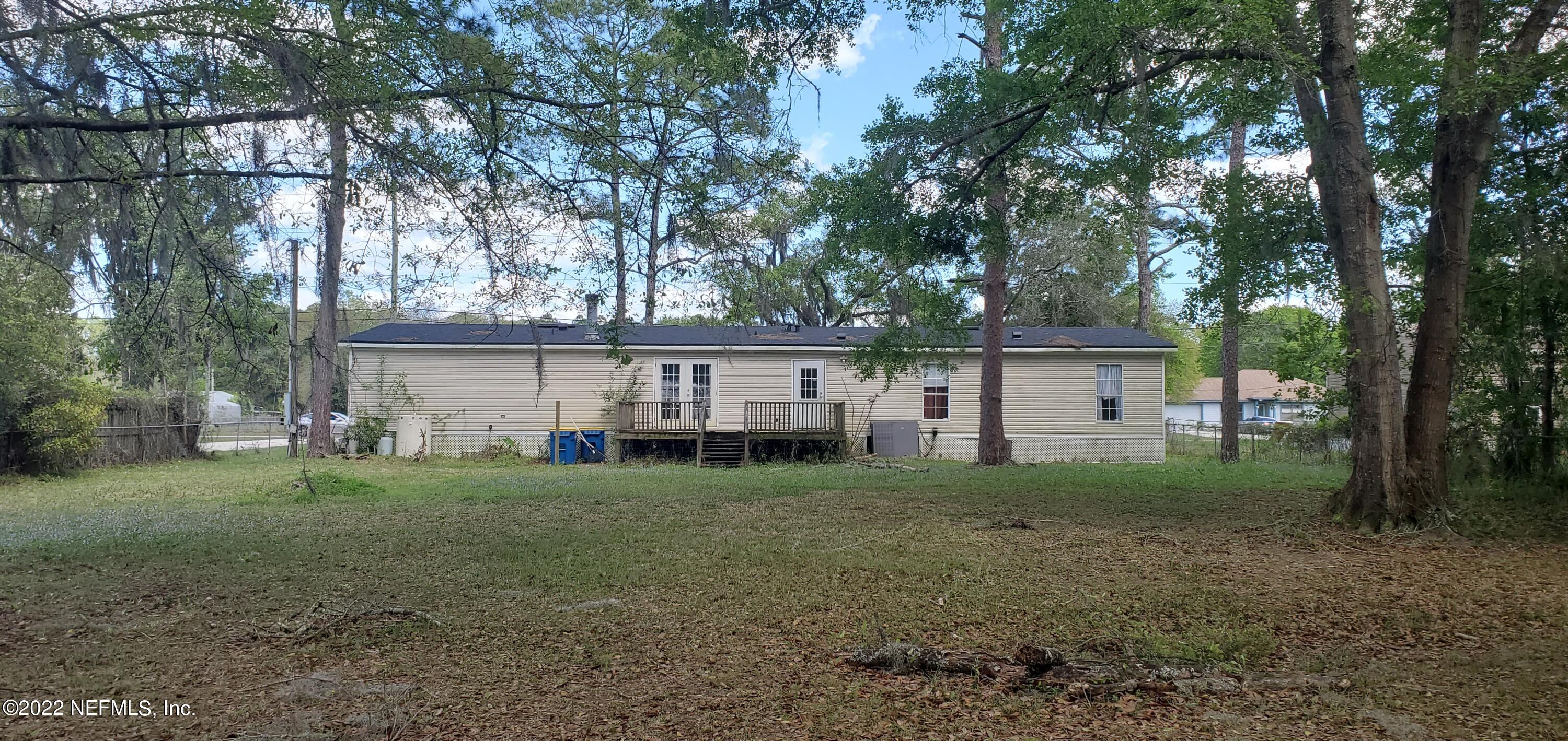 13464 Yellow Bluff Road Jacksonville, FL 32226 - Photo 3 of 20 a view of a house with a yard