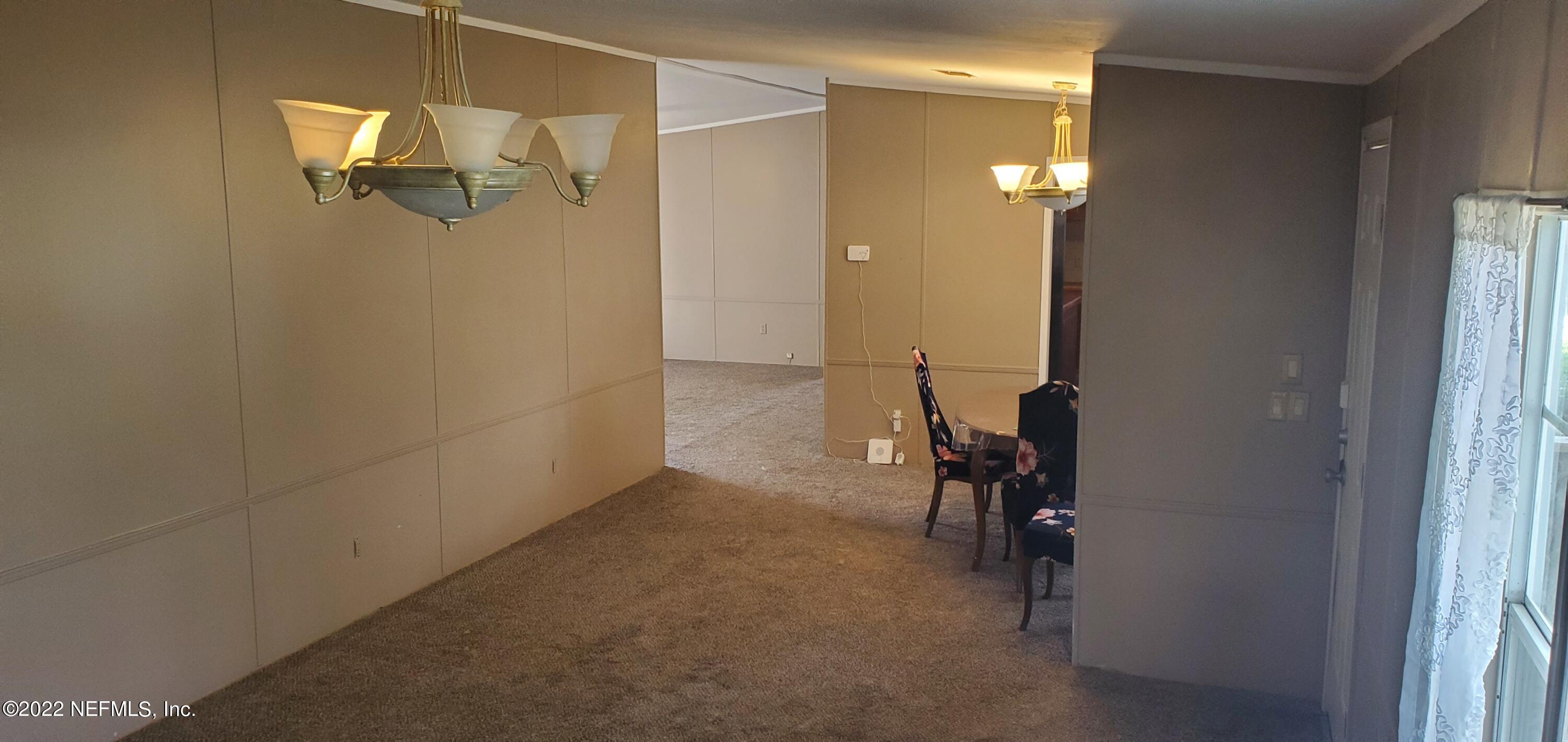 13464 Yellow Bluff Road Jacksonville, FL 32226 - Photo 6 of 20 a view of a room with painted walls