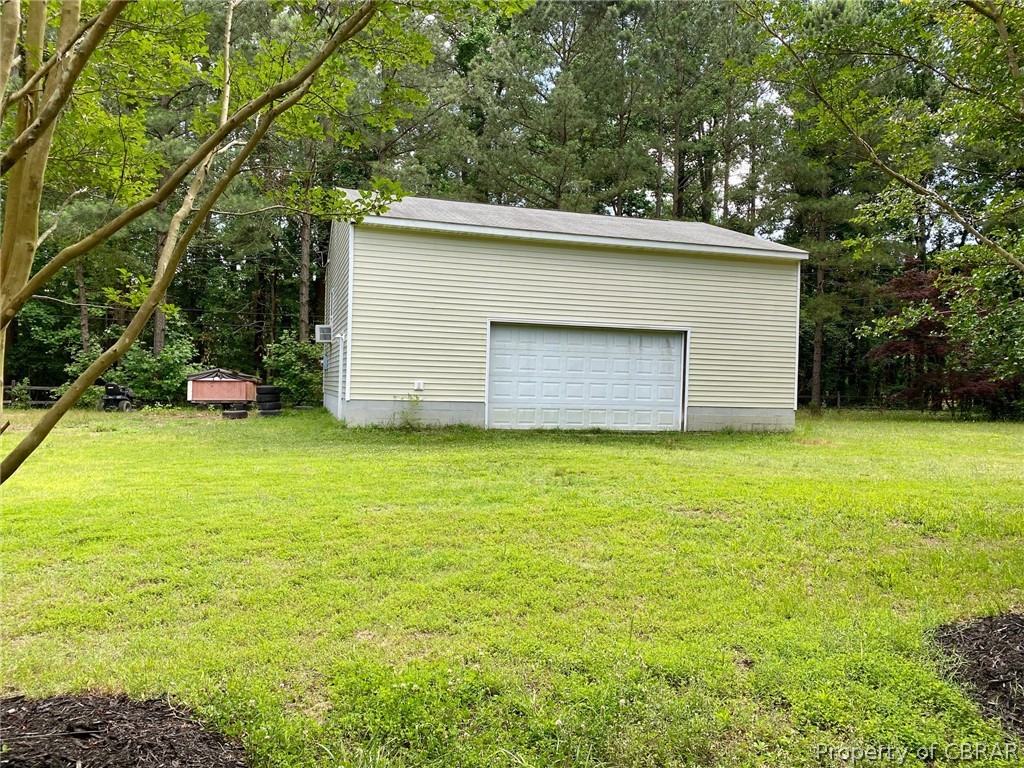 3948 Paradise Point Road Hayes, VA 23072 - Photo 14 of 15 Huge detach garage with large storage area over part of the building.