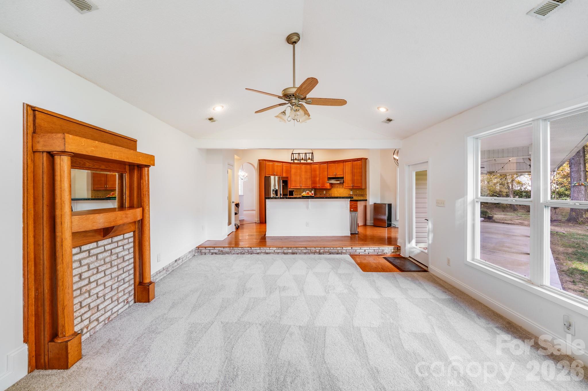 5329 Kuykendall Road Charlotte, NC 28270 - Photo 13 of 18 wooden floor in an empty room with a window