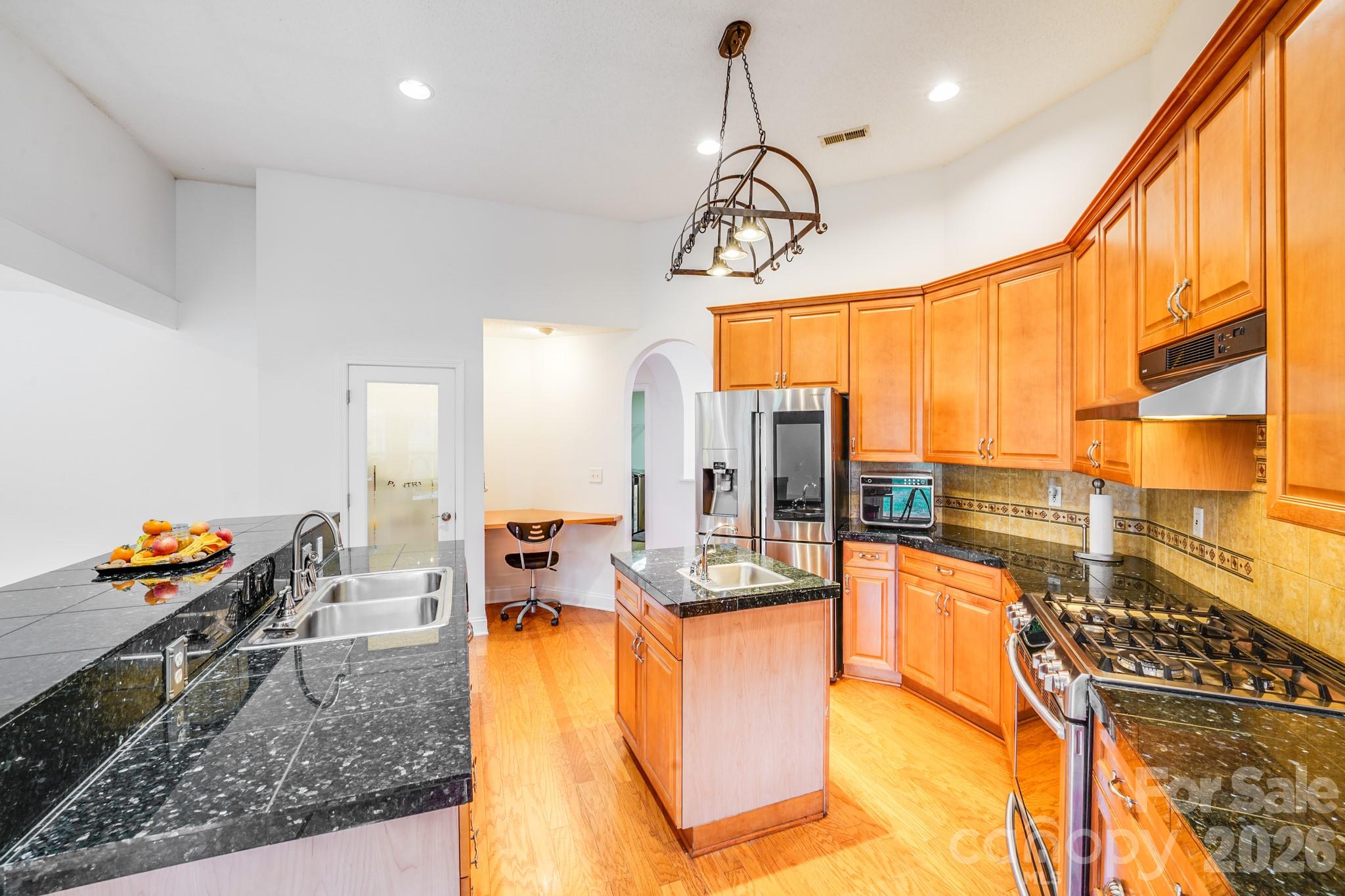 5329 Kuykendall Road Charlotte, NC 28270 - Photo 16 of 18 a very nice looking living room with a large kitchen counter and a view of living room