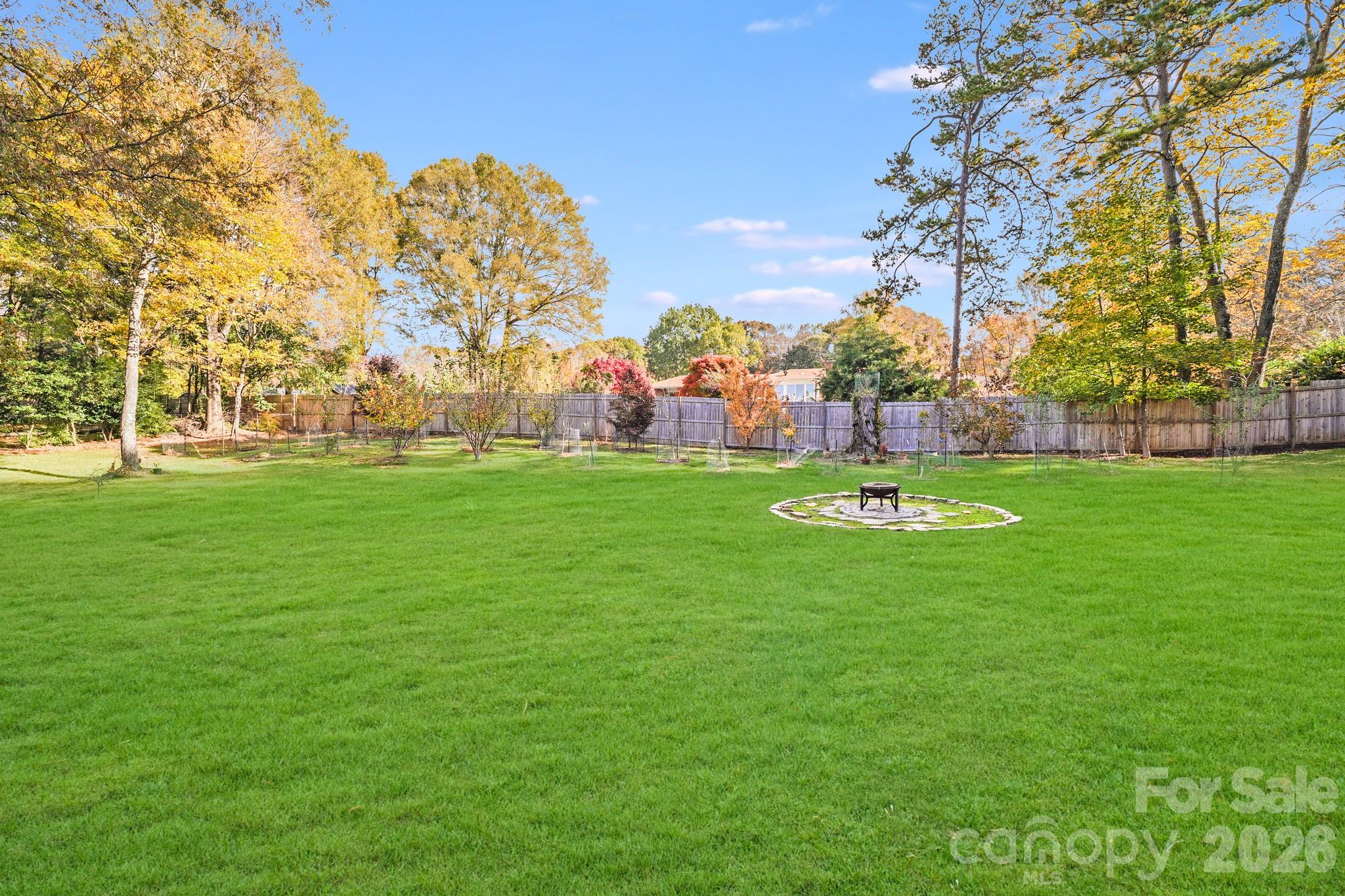 5329 Kuykendall Road Charlotte, NC 28270 - Photo 4 of 18 a view of a park with large trees