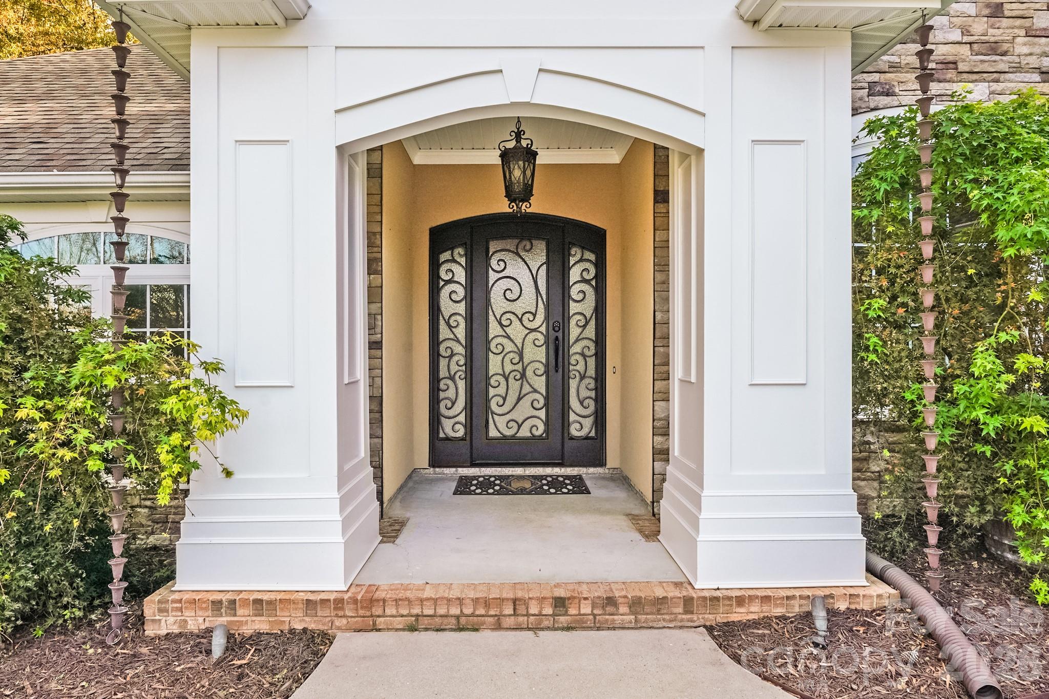 5329 Kuykendall Road Charlotte, NC 28270 - Photo 7 of 18 a front view of a house with a yard