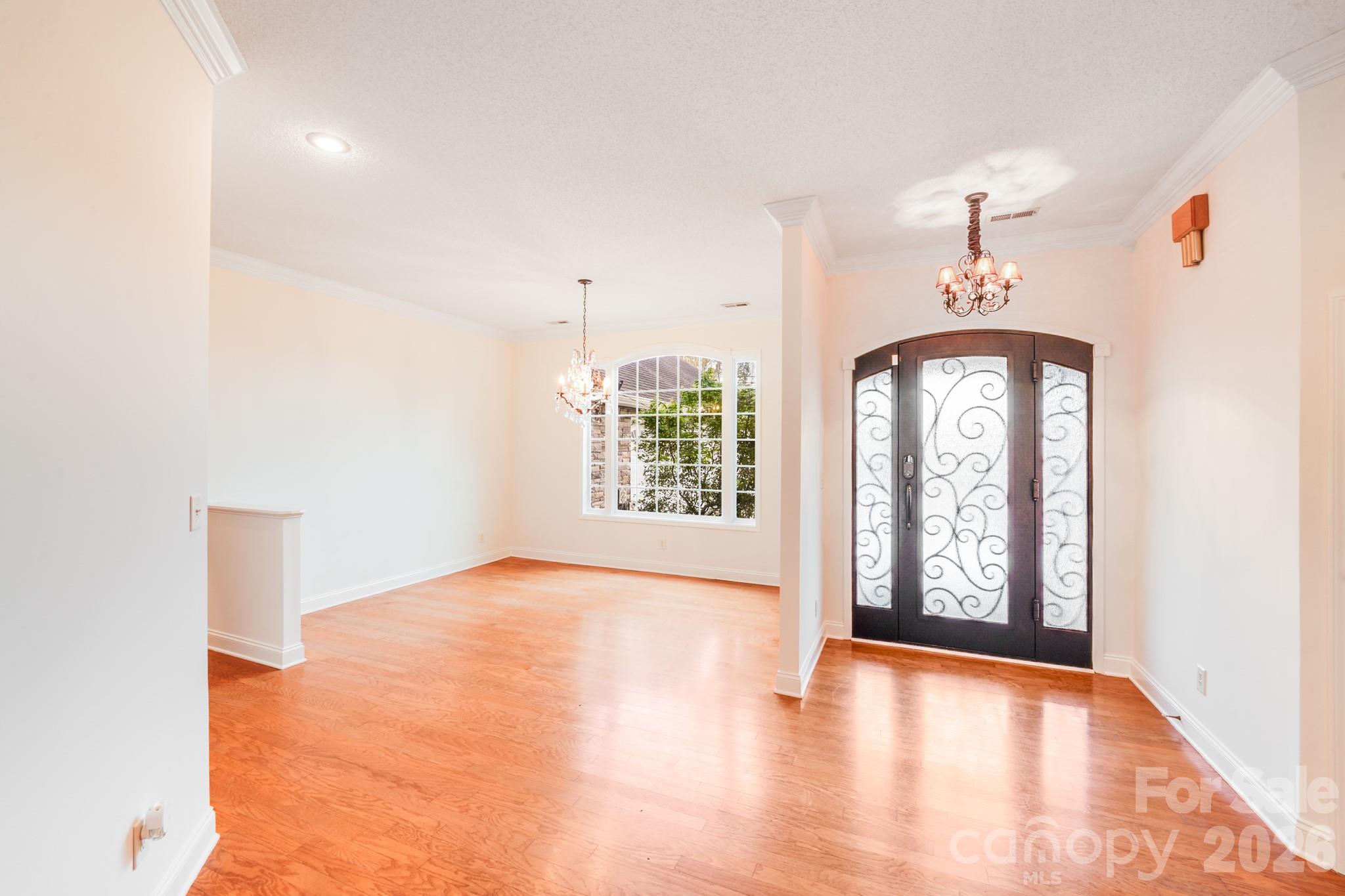 5329 Kuykendall Road Charlotte, NC 28270 - Photo 9 of 18 wooden floor in an empty room with a window