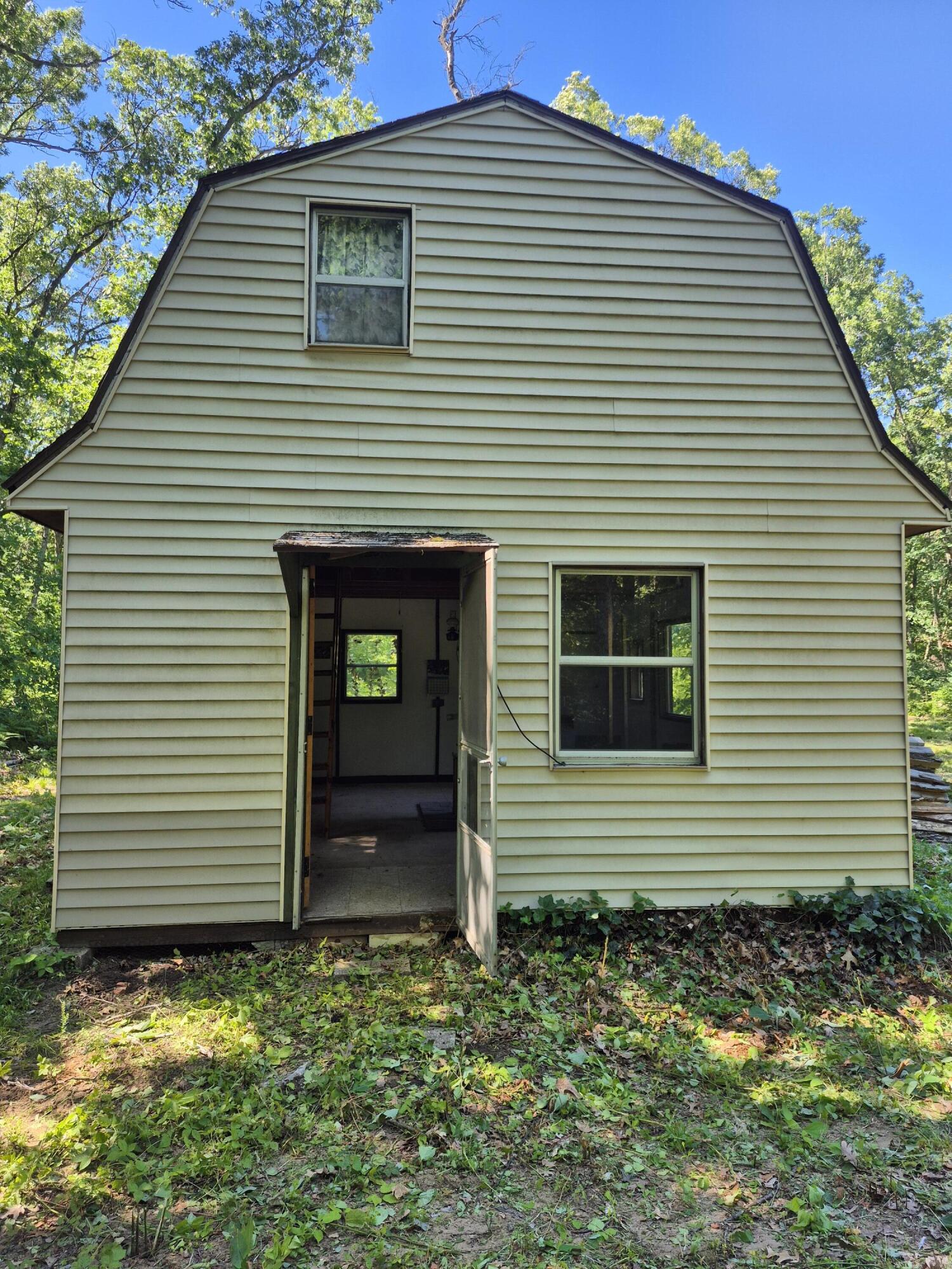 7018 Sweeter Road Twin Lake, MI 49457 - Photo 5 of 13 20260620_164650