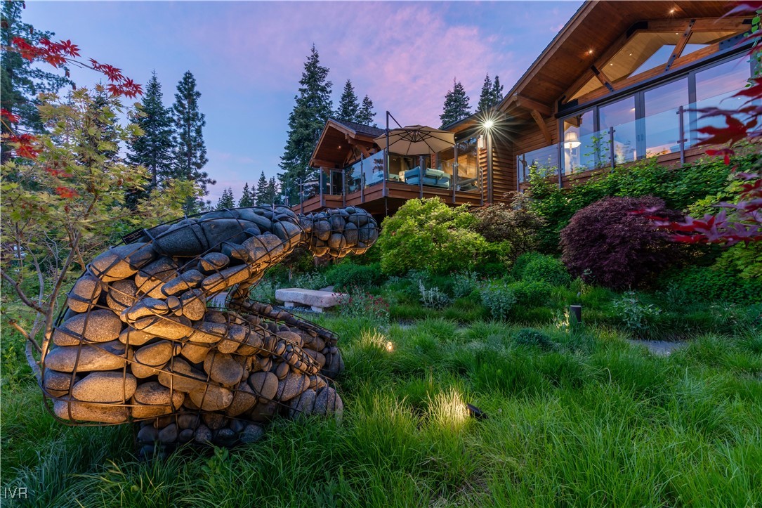 a backyard of a house with lots of green space