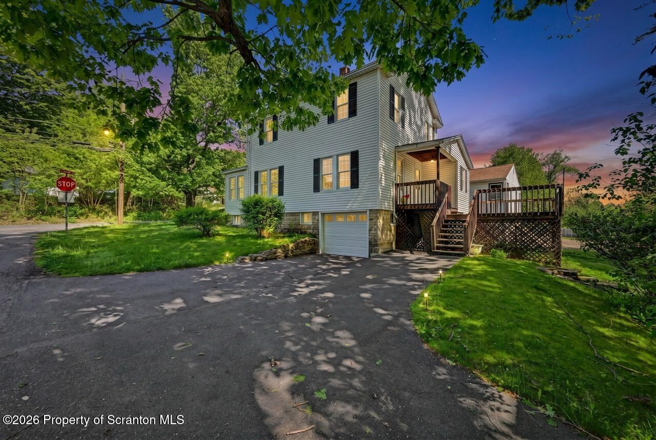 502 Layton Road Clarks Summit, PA 18411 - Photo 42 of 42 a front view of a house with a yard