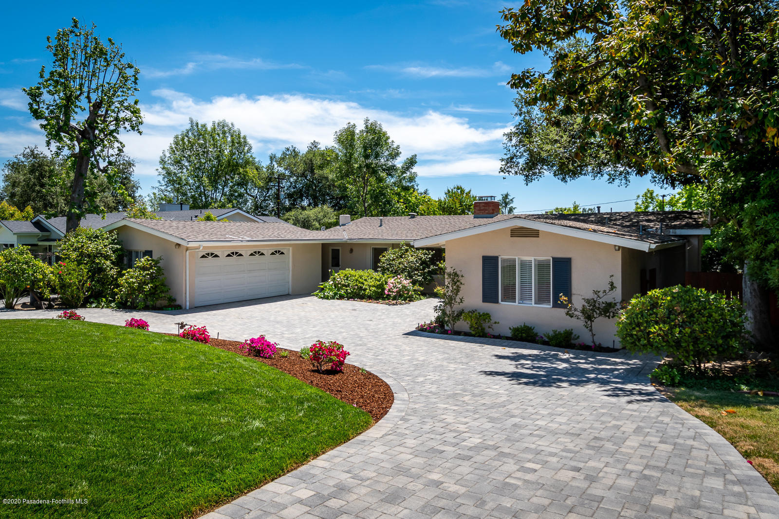 820 Chehalem Road La Canada Flintridge, CA 91011 - Photo 2 of 59 a front view of house with yard and trees