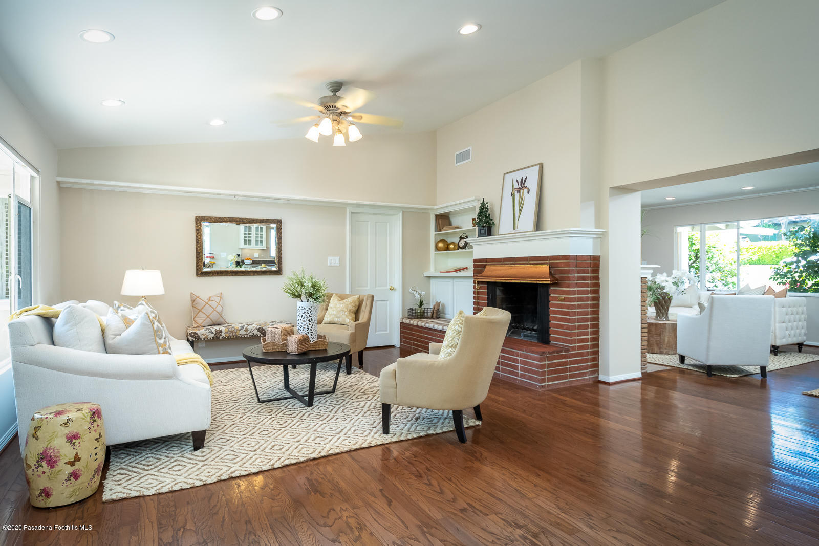 820 Chehalem Road La Canada Flintridge, CA 91011 - Photo 13 of 59 a living room with fireplace furniture and a wooden floor