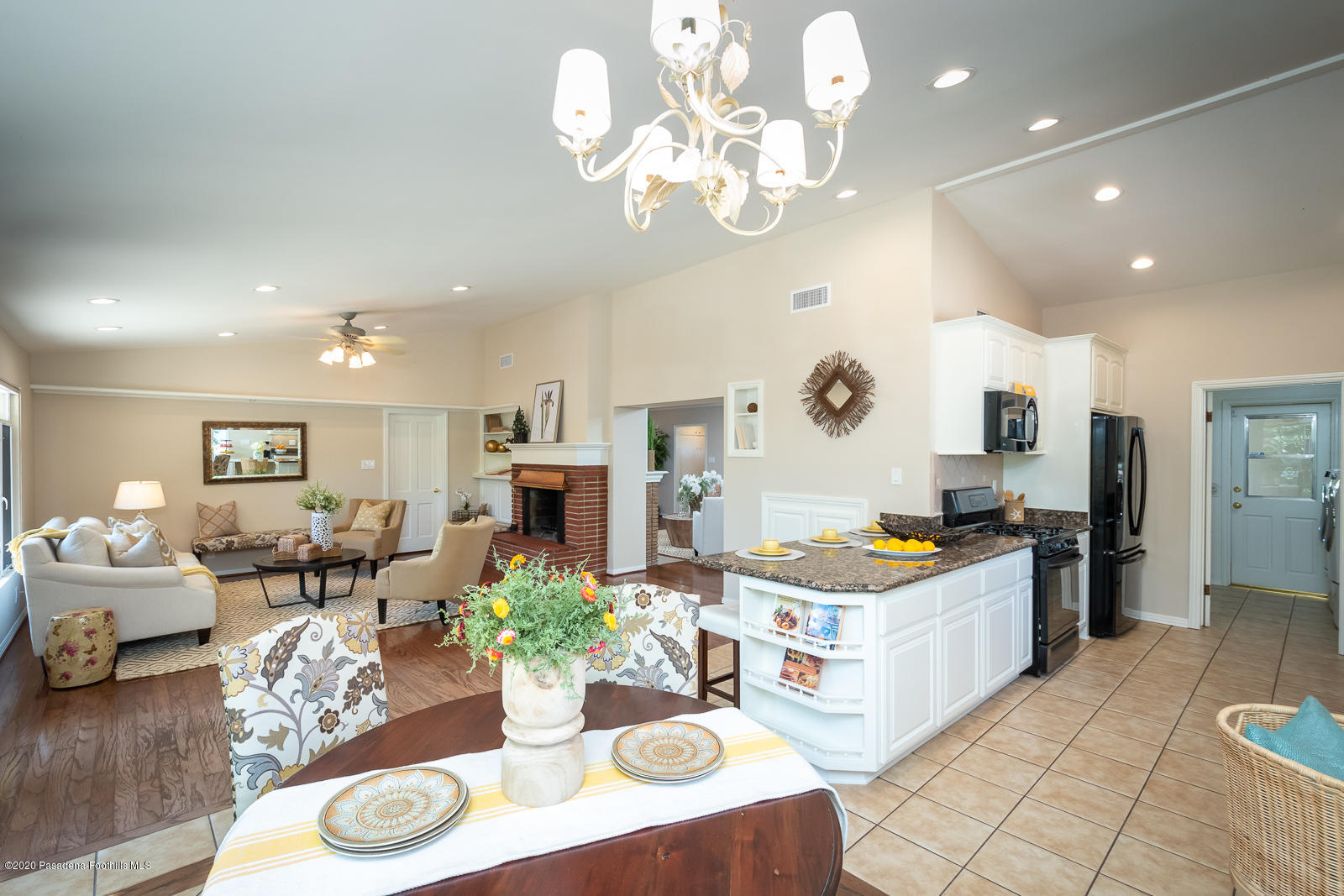 820 Chehalem Road La Canada Flintridge, CA 91011 - Photo 14 of 59 a large kitchen with a table and chairs