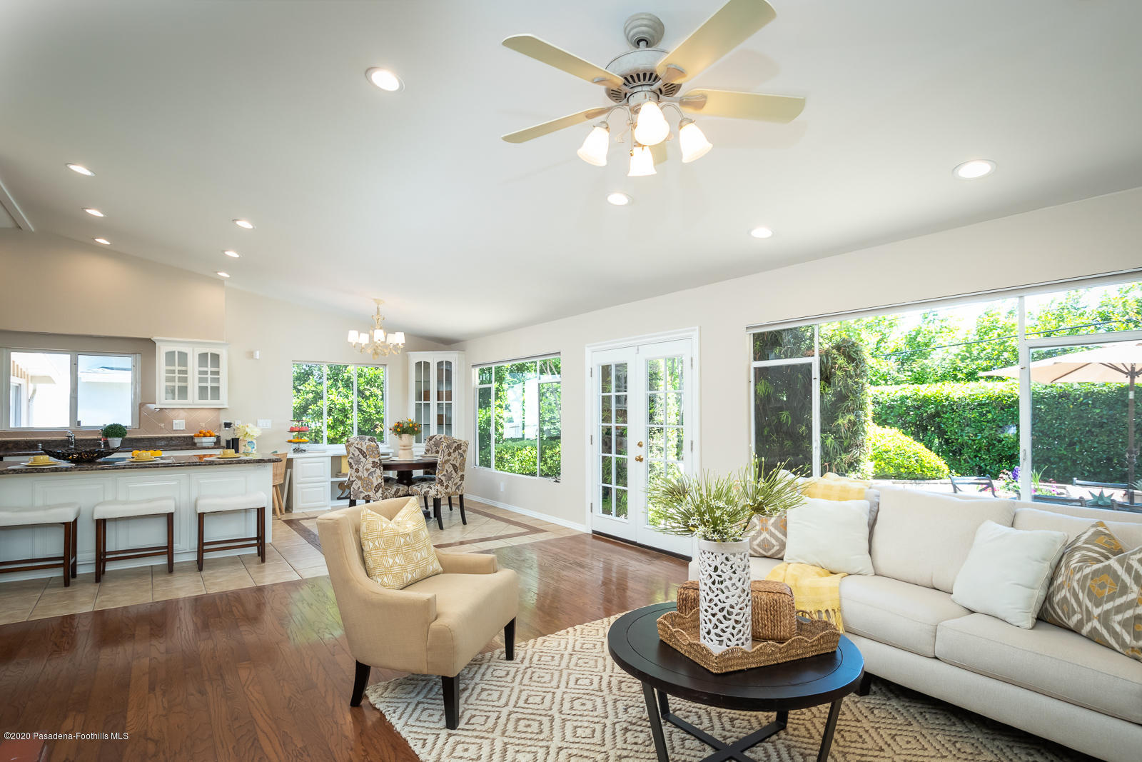 820 Chehalem Road La Canada Flintridge, CA 91011 - Photo 16 of 59 a living room with fireplace furniture and a large window