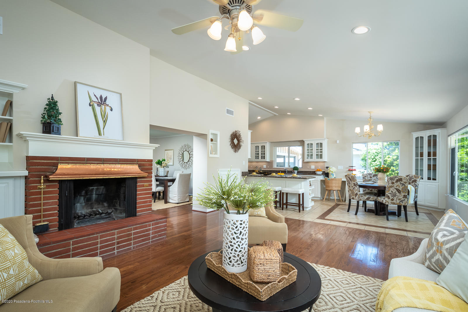 820 Chehalem Road La Canada Flintridge, CA 91011 - Photo 17 of 59 a living room with furniture and a fireplace