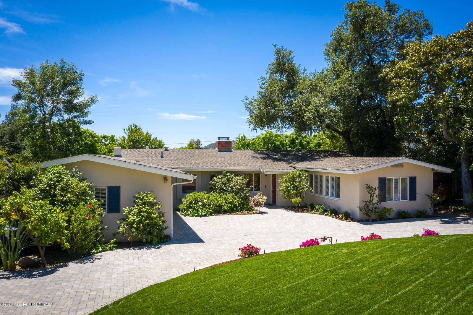 820 Chehalem Road La Canada Flintridge, CA 91011 - Photo 3 of 59 a front view of a house with a yard