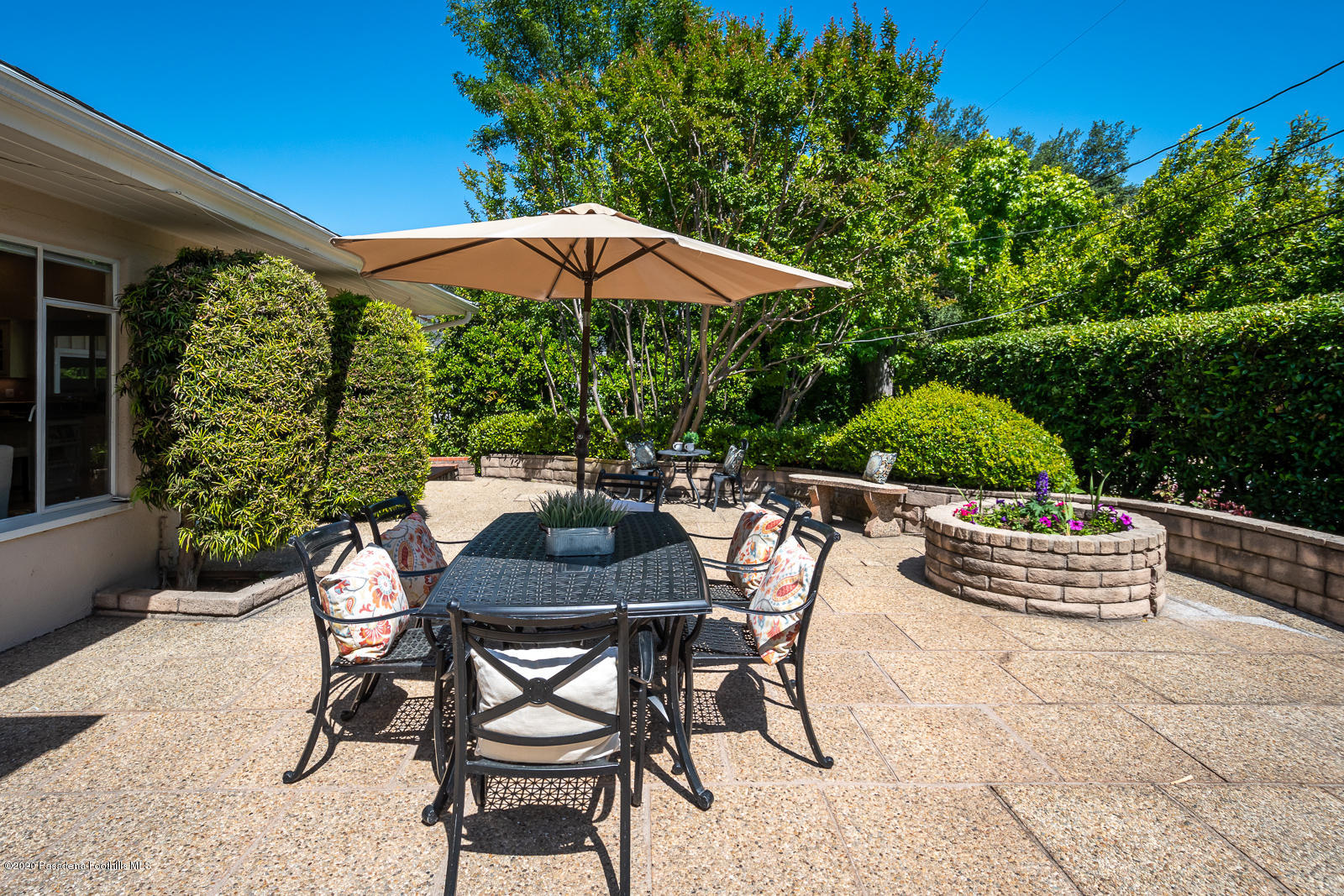 820 Chehalem Road La Canada Flintridge, CA 91011 - Photo 52 of 59 a patio with a yard table and chairs