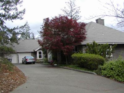 1855 Happy Valley Road Santa Rosa, CA 95404 - Photo 2 of 11 a car parked in front of white house