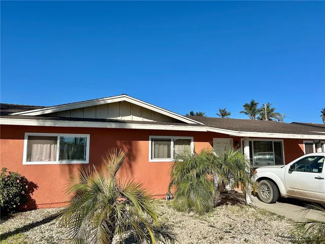 a front view of a house with a porch