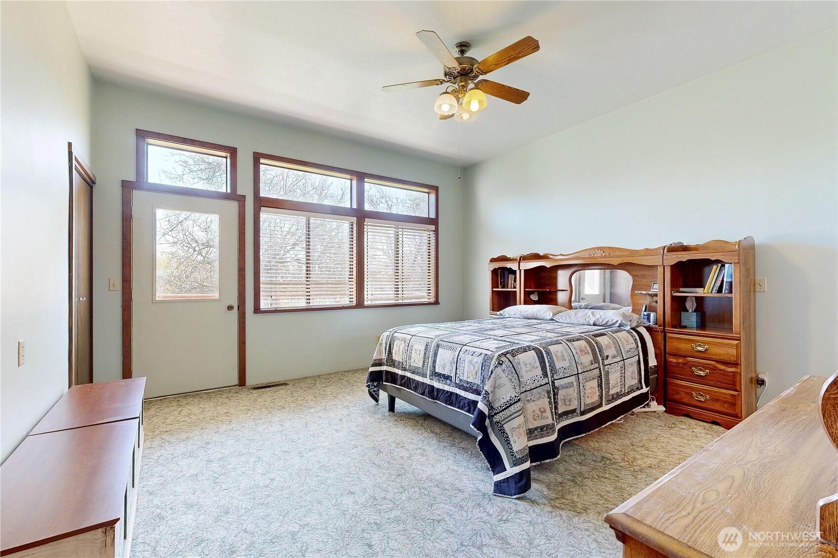 457 Prospect Avenue Walla Walla, WA 99362 - Photo 17 of 40 a bedroom with a bed and a chandelier