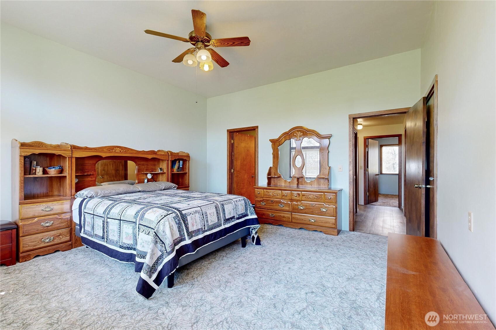 457 Prospect Avenue Walla Walla, WA 99362 - Photo 18 of 40 a bedroom with a bed and a chandelier