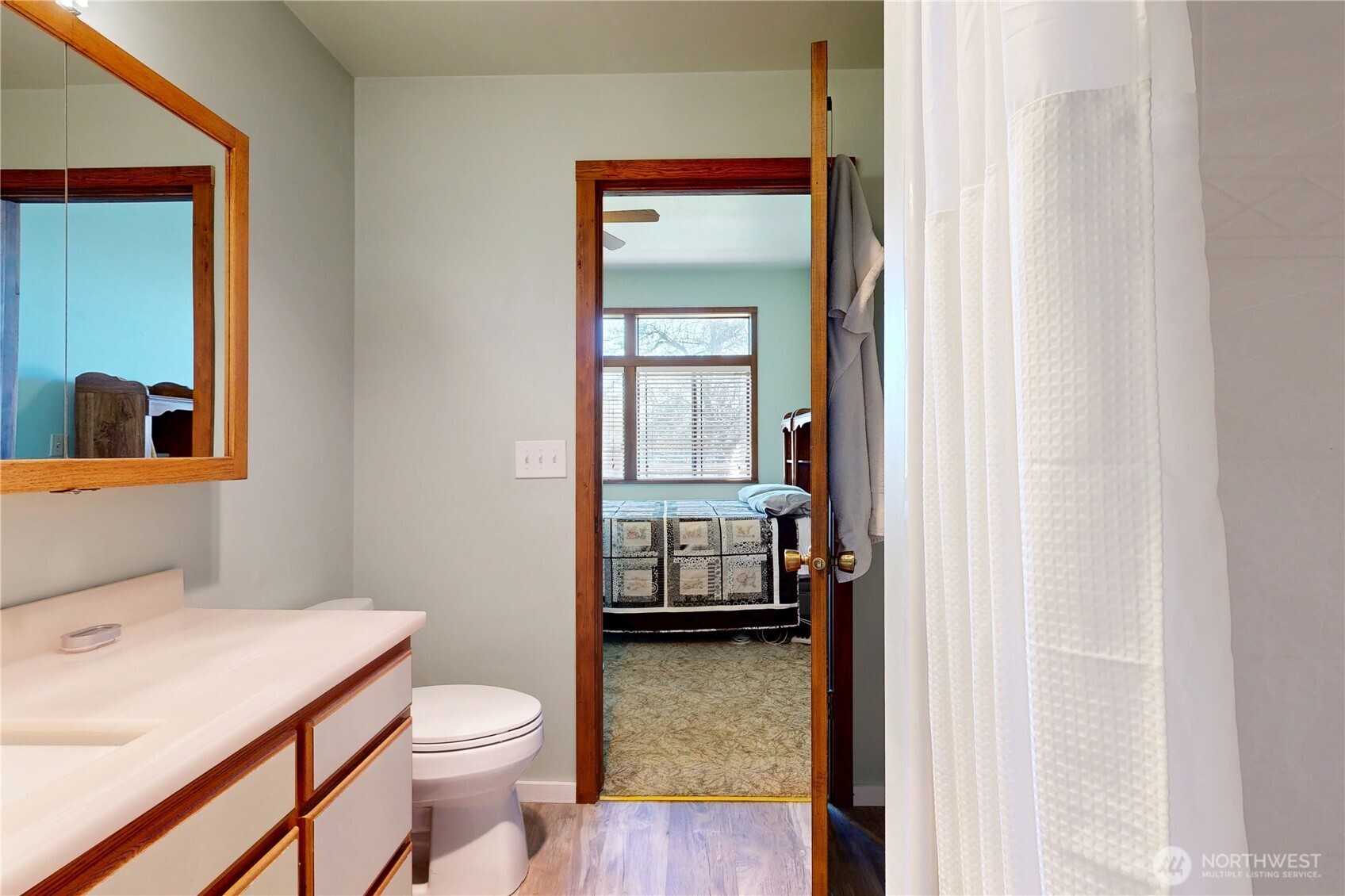 457 Prospect Avenue Walla Walla, WA 99362 - Photo 19 of 40 a bathroom with a toilet sink and mirror