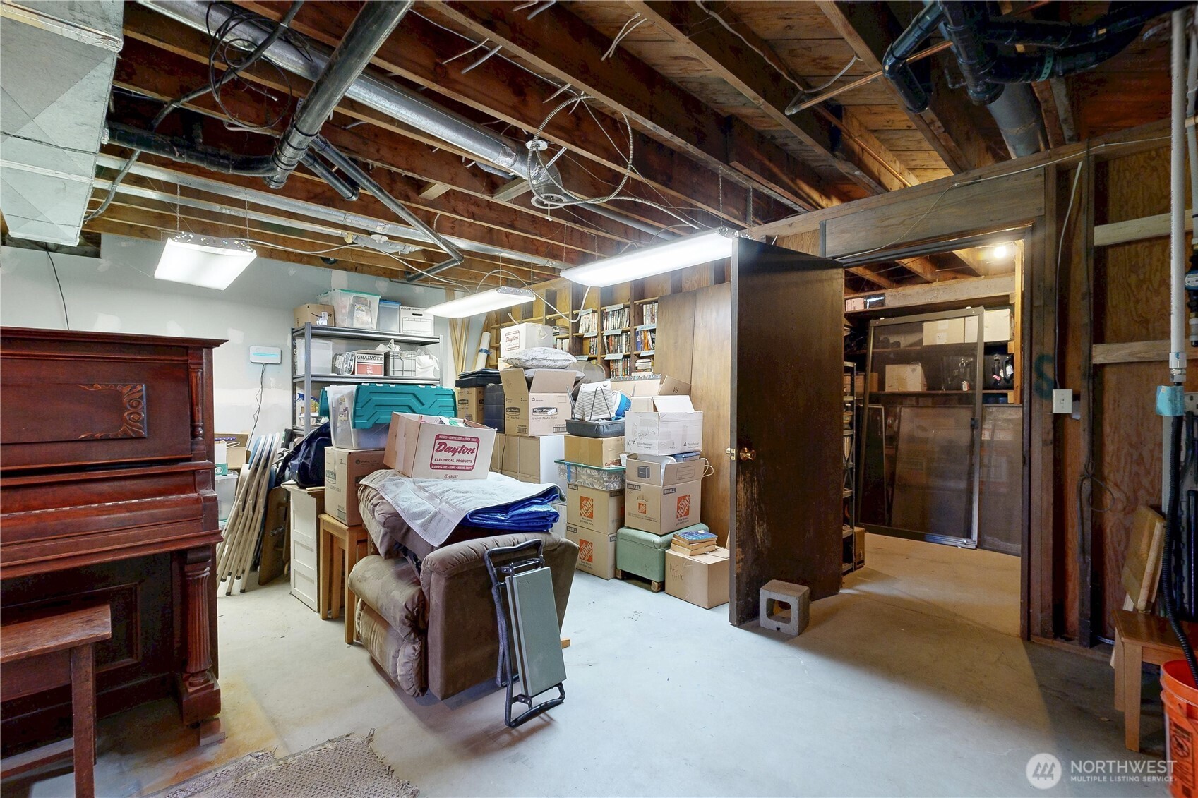 457 Prospect Avenue Walla Walla, WA 99362 - Photo 34 of 40 a view of a storage room with racks a chandelier