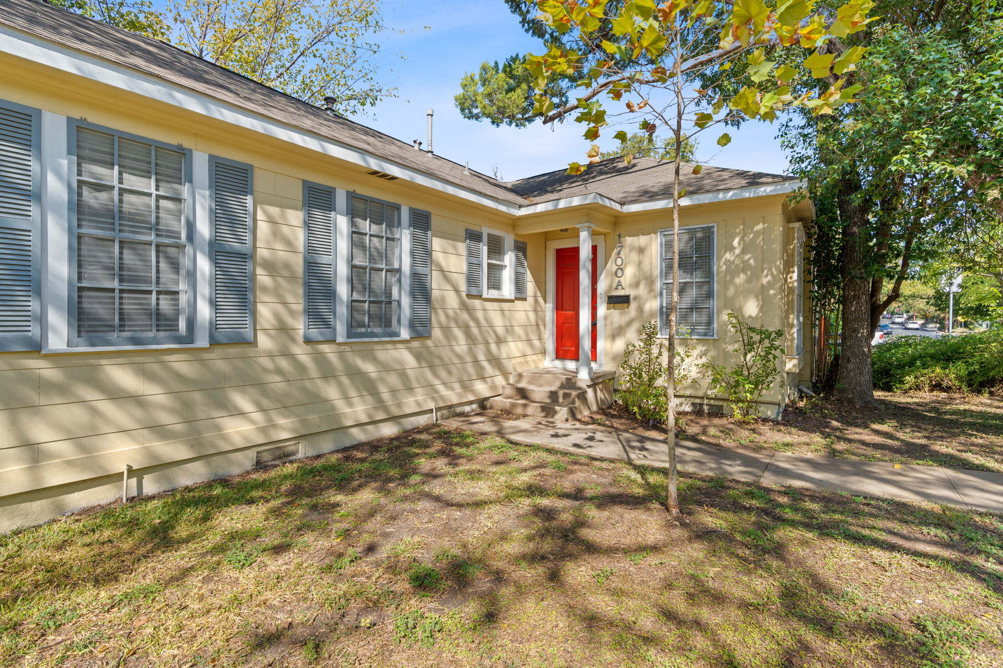 1700 Northwood Road Austin, TX 78703 - Photo 15 of 40 a front view of a house with a yard