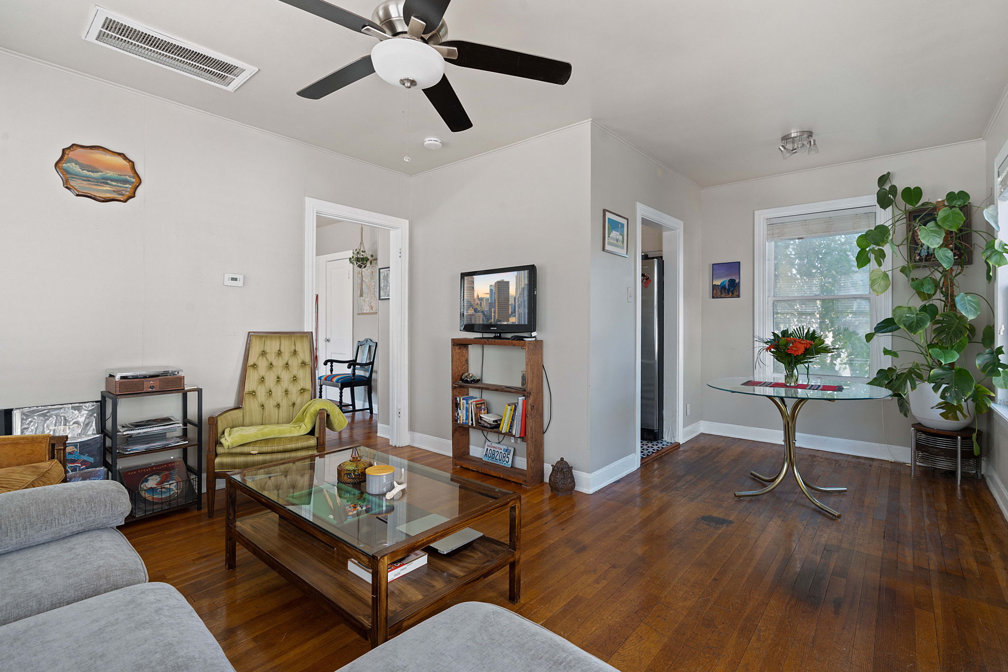 1700 Northwood Road Austin, TX 78703 - Photo 29 of 40 a living room with furniture and a potted plant