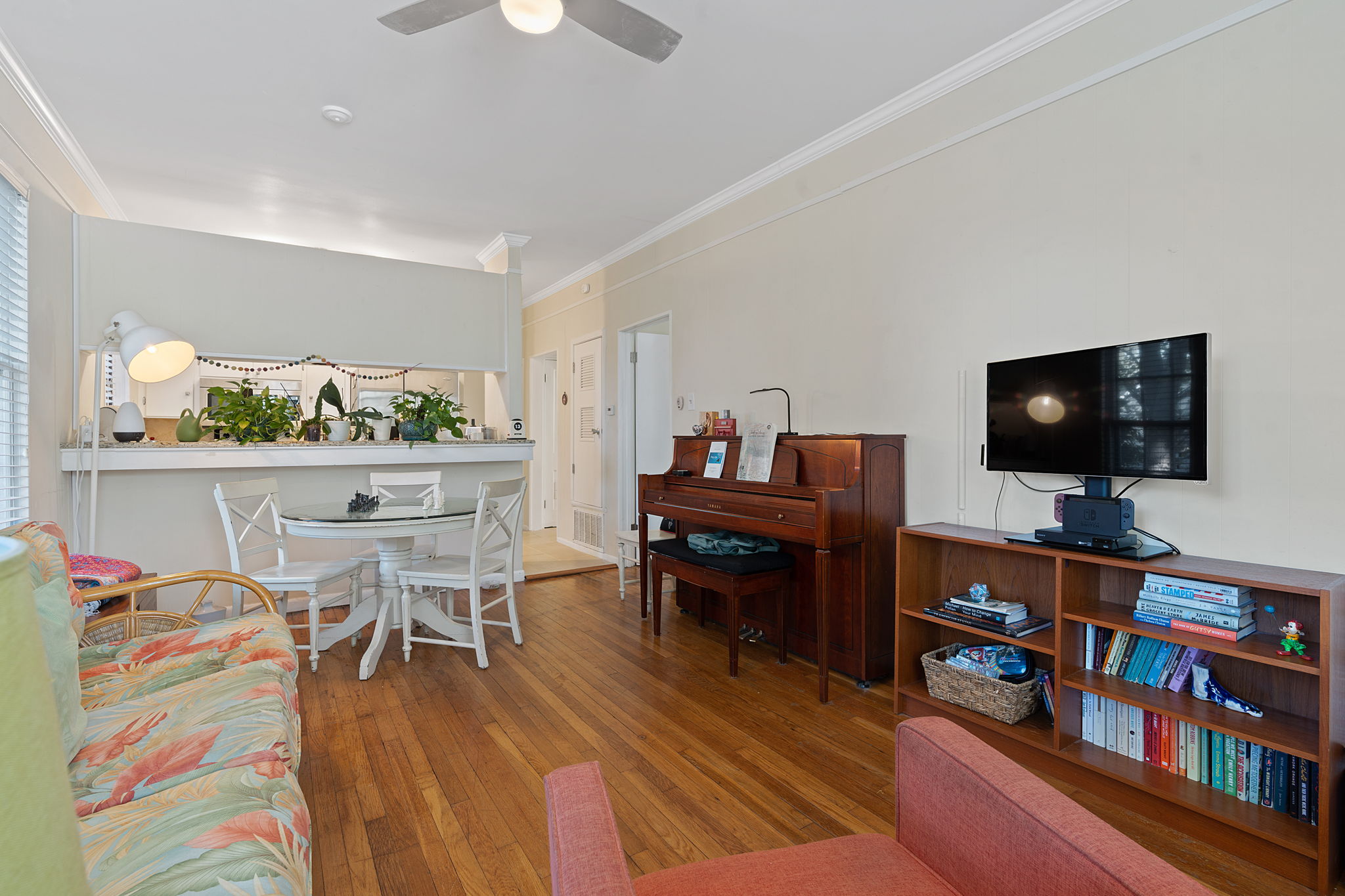 1700 Northwood Road Austin, TX 78703 - Photo 5 of 40 a living room with furniture and a flat screen tv