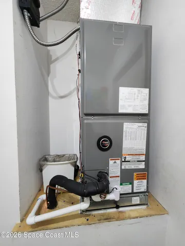 a bathroom with a sink mirror and vanity