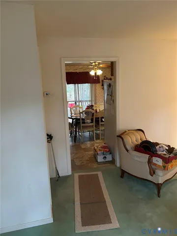 a living room with furniture and a table