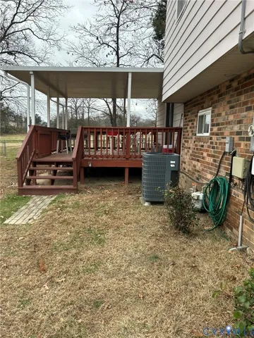 a view of a backyard with sitting area and roof