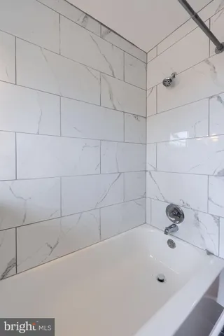 a bathroom with a bathtub