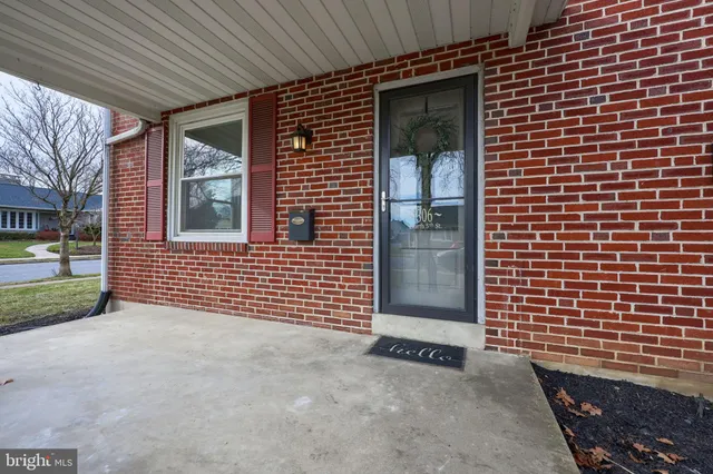 a view of a brick house with a door