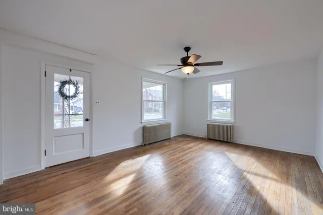 a view of livingroom with hardwood floor and window