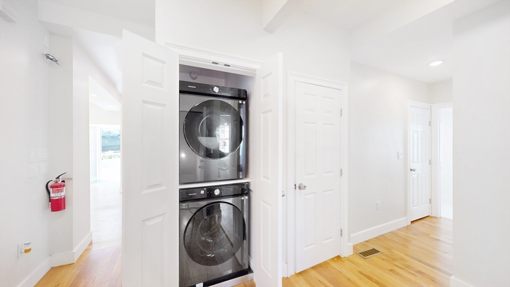48 Rockwell Street, Unit 1 Malden, MA 02148 - Photo 11 of 34 a utility room with dryer and washer