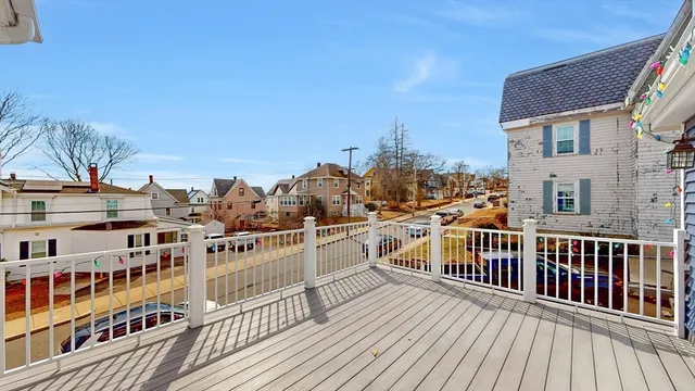 a view of buildings from a balcony